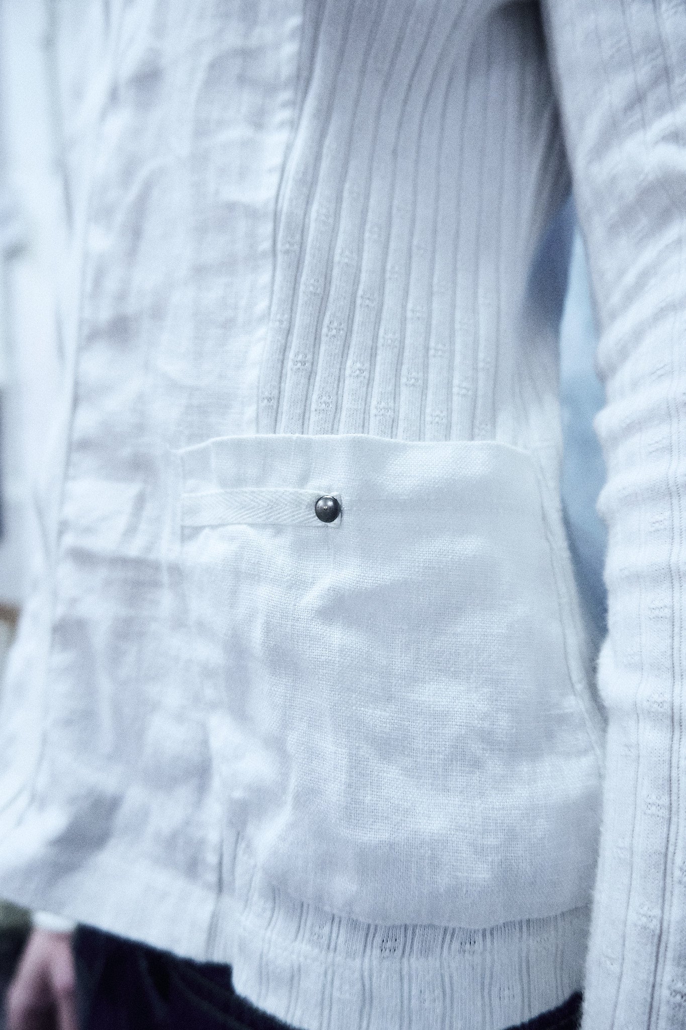 White long-sleeved top