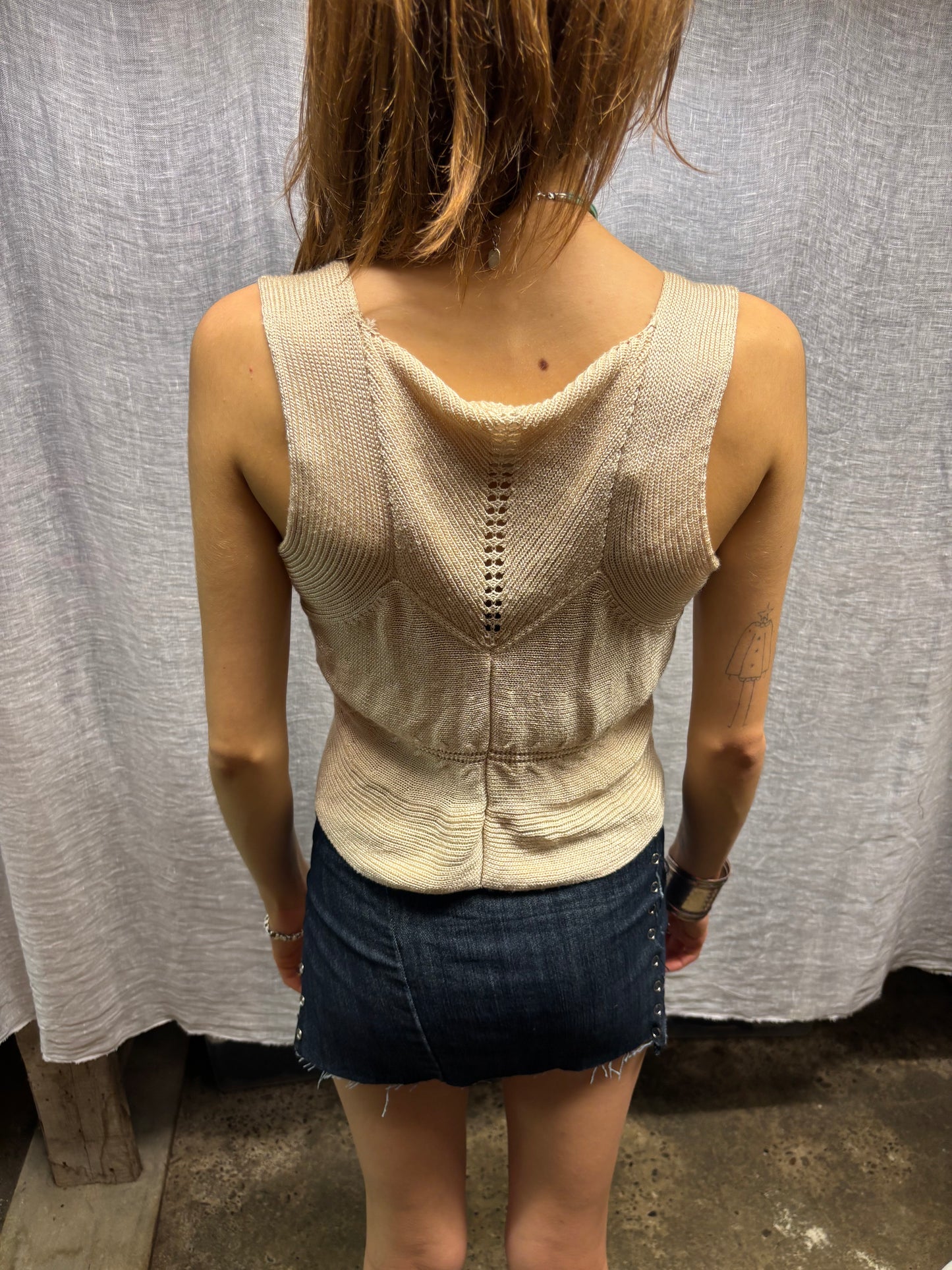 Small sleeveless cardigan