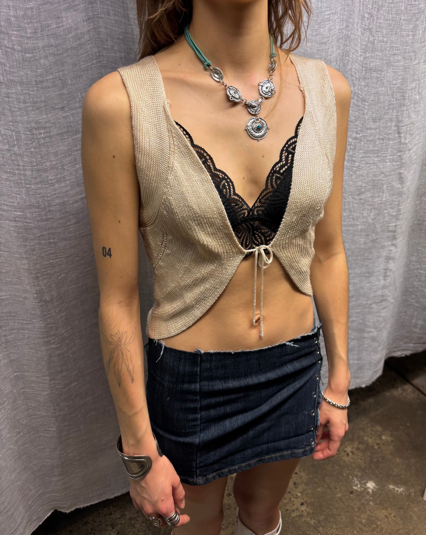Small sleeveless cardigan